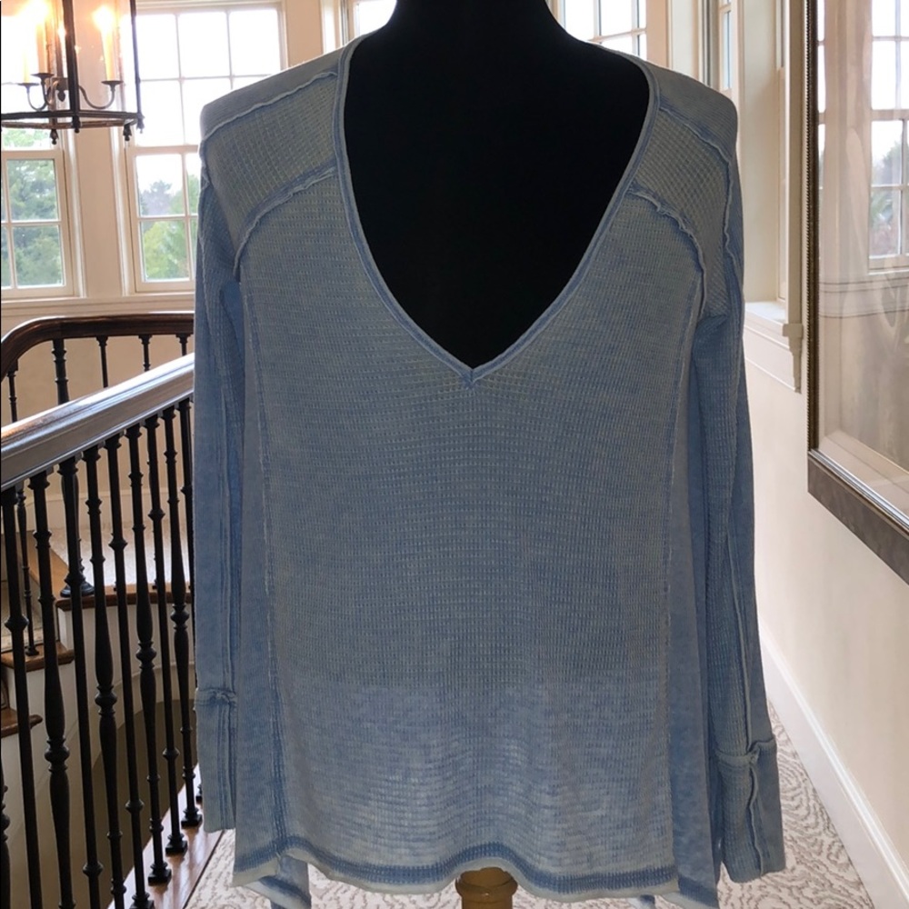 Free People oversized and deep cut sweater